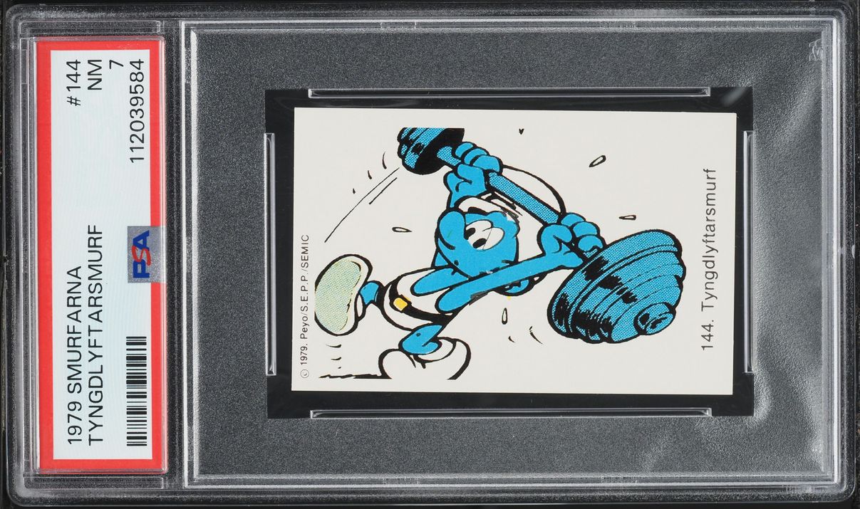 1979 Andra Motiv Smurfarna Tyngdlyftarsmurf #144 PSA 7 NRMT